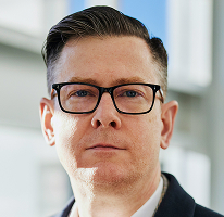 Retrato do CEO Alexander Hughes empresa de negociação de criptografia executivo